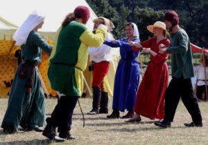 Two rows of dancers perform a dance display