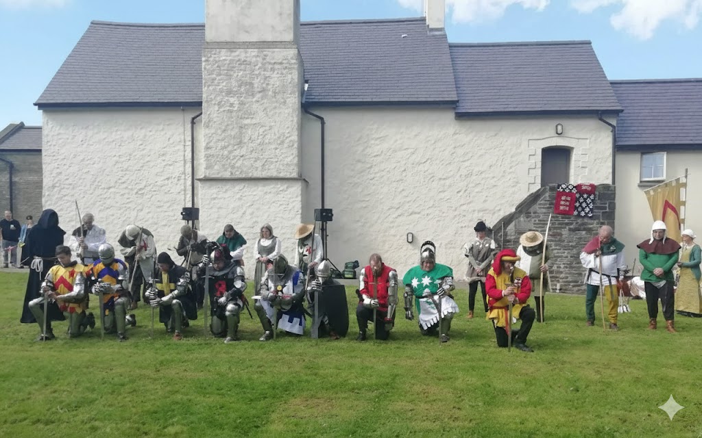 Knights, squires and archers of the MCS line up to take a bow