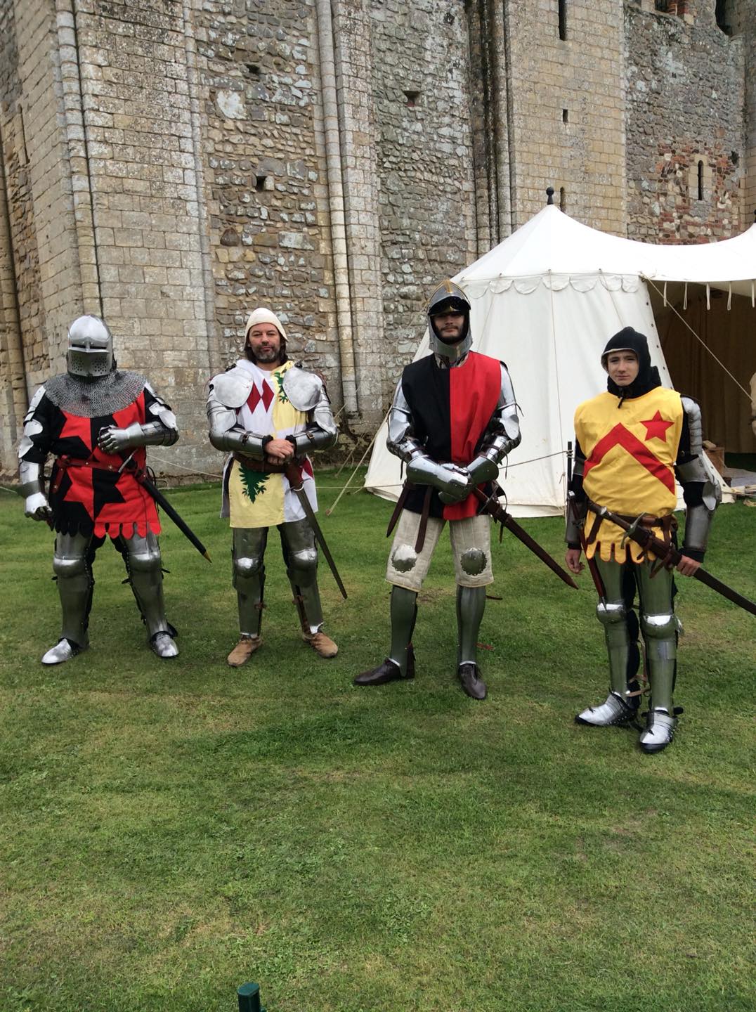 Knights ready for a tournament knights in armour with swords stand ready